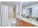 Bathroom featuring a tiled shower, modern vanity, and neutral design at 1700 Bassett St # 412, Denver, CO 80202