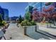 Beautifully landscaped building exterior with flowerbeds and modern architecture at 1700 Bassett St # 412, Denver, CO 80202