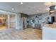A cozy kitchenette with stainless steel appliances, stylish cabinets, and tiled backsplash at 1700 Bassett St # 412, Denver, CO 80202