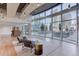 Comfortable lounge area with floor to ceiling windows and cityscape views at 1700 Bassett St # 412, Denver, CO 80202