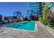 Sparkling pool at building featuring lounge areas and city views at 1700 Bassett St # 412, Denver, CO 80202