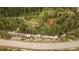 Aerial view of property with a river, trees, and road adjacent to the land, creating a picturesque setting at 35106 Boulder Canyon Dr, Boulder, CO 80302
