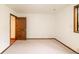 Bright bedroom featuring carpet, natural light, and neutral walls at 35106 Boulder Canyon Dr, Boulder, CO 80302