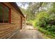 Exterior view of home with wood siding, window, and landscaping at 35106 Boulder Canyon Dr, Boulder, CO 80302