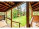 View from cabin porch of unfinished outbuilding on a grassy hillside at 35106 Boulder Canyon Dr, Boulder, CO 80302