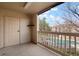 Private balcony overlooking a community pool, offering a tranquil outdoor space at 9212 E Arbor Cir # E, Englewood, CO 80111