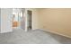 Spacious bedroom with closet, neutral carpet, and an ensuite bathroom at 9212 E Arbor Cir # E, Englewood, CO 80111