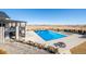 Enjoy the community pool with mountain views, perfect for relaxation and recreation, plus a covered patio area at 8016 Gore Creek Ln, Littleton, CO 80125