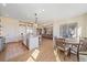 Spacious living space with an open floor plan connecting the kitchen, dining area, and living room at 8016 Gore Creek Ln, Littleton, CO 80125