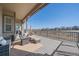 Outdoor patio with inviting seating, a cozy fire pit, and neighborhood views at 8016 Gore Creek Ln, Littleton, CO 80125