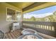 Comfortable balcony with mountain views, outdoor seating, and dog bed at 6435 Spotted Fawn Run, Littleton, CO 80125