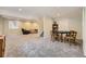 Large finished basement features a game table, seating, and additional living space at 6435 Spotted Fawn Run, Littleton, CO 80125
