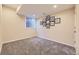 A carpeted bedroom with natural light, a window to the outside and space for relaxing at 6435 Spotted Fawn Run, Littleton, CO 80125
