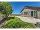 Backyard with a well-manicured lawn, privacy fence, and concrete patio, offers a relaxing outdoor space at 17720 Weymouth Ave, Parker, CO 80134