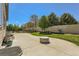 Well-maintained backyard featuring a lush lawn, concrete patio, and privacy fence, perfect for outdoor enjoyment at 17720 Weymouth Ave, Parker, CO 80134