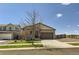 Charming single-story home with a two-car garage, green lawn and inviting curb appeal at 17720 Weymouth Ave, Parker, CO 80134