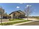 Well-maintained single-story home with a two-car garage and a neatly landscaped front yard at 17720 Weymouth Ave, Parker, CO 80134