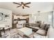 Spacious living room with seamless flow to kitchen and dining, ideal for entertaining at 17720 Weymouth Ave, Parker, CO 80134
