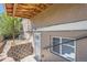 View of house featuring covered porch and walkout basement at 2060 W Iliff Ave, Englewood, CO 80110