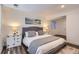 Tastefully decorated bedroom with stylish furnishings and hardwood floors at 2060 W Iliff Ave, Englewood, CO 80110