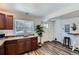 Kitchenette featuring dark wood cabinets and a small dining table at 2060 W Iliff Ave, Englewood, CO 80110