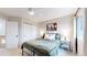 Charming bedroom with a metal bed frame and closet at 6495 S Wright St, Littleton, CO 80127