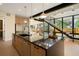 Open concept kitchen features a large island, stainless steel appliances, and modern design at 1601 S Columbine St, Denver, CO 80210