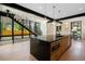 Modern kitchen with a large center island, stainless steel appliances, and sleek design elements at 1601 S Columbine St, Denver, CO 80210