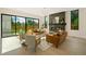 Stylish living room with a fireplace, hardwood floors, and large windows offering natural light at 1601 S Columbine St, Denver, CO 80210