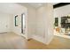 Well-lit mud room features a dog wash station, tiled flooring, and convenient storage at 1601 S Columbine St, Denver, CO 80210
