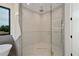 Modern shower with glass door and elegant tile at 1601 S Columbine St, Denver, CO 80210