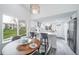 Modern kitchen features white countertops, appliances, and an open layout at 16086 E Ithaca Pl # D, Aurora, CO 80013