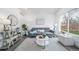 Inviting living room with neutral decor, bright natural light, and modern furnishings at 16086 E Ithaca Pl # D, Aurora, CO 80013