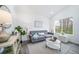Inviting living room with neutral decor, bright natural light, and modern furnishings at 16086 E Ithaca Pl # D, Aurora, CO 80013
