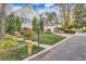 Charming home with lush landscaping, mature trees, and a well-maintained lawn at 4505 S Yosemite St # 102, Denver, CO 80237