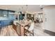 Beautiful eat-in kitchen with an island featuring a breakfast bar and open to dining and living areas at 4505 S Yosemite St # 102, Denver, CO 80237