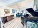 Open-concept living room with elegant furnishings, natural light, and ample space for entertaining at 4505 S Yosemite St # 102, Denver, CO 80237
