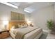 Cozy bedroom with ample natural light, modern decor, and comfortable furnishings at 2374 S University Blvd # 503, Denver, CO 80210