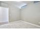 Comfortable bedroom features neutral walls, soft carpet, and bright natural light from window at 2374 S University Blvd # 503, Denver, CO 80210