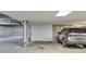 Parking garage with assigned space and silver SUV at 2374 S University Blvd # 503, Denver, CO 80210