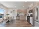 Well-lit kitchen and dining area with stainless steel appliances and modern cabinetry at 2374 S University Blvd # 503, Denver, CO 80210