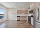 Modern kitchen features stainless steel appliances and wood floors at 2374 S University Blvd # 503, Denver, CO 80210