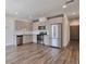 Modern kitchen features stainless steel appliances and wood floors at 2374 S University Blvd # 503, Denver, CO 80210
