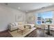 Bright and modern living space with dining area, hardwood floors, and large windows at 2374 S University Blvd # 503, Denver, CO 80210