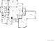Detailed floor plan showcasing the layout of the main floor, including the kitchen, living spaces, and garage at 7572 Kelty Trl, Franktown, CO 80116