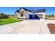 Spacious three car garage and wide concrete driveway on this lovely home at 7572 Kelty Trl, Franktown, CO 80116