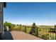 Outdoor deck with seating and a beautiful view, ideal for relaxing and entertaining at 6787 Serena Ave, Castle Pines, CO 80108