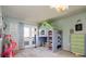 Fun bedroom design with a built-in playhouse bed, soft carpet, and a playful color scheme, great for  at 6787 Serena Ave, Castle Pines, CO 80108