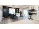 Eat in kitchen with navy accent wall, stainless steel refrigerator and stainless steel appliances at 6787 Serena Ave, Castle Pines, CO 80108