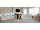 Bright playroom area with ample natural light and space for activities at 6787 Serena Ave, Castle Pines, CO 80108